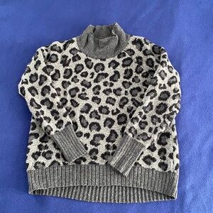 Leopard print turtleneck sweater